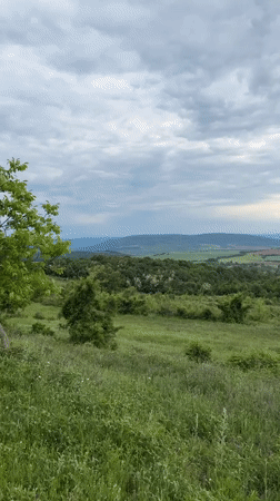 Countryside views captured near Strazhitsa, Bulgaria under cloudy skies