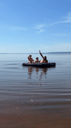 Family enjoys raft outing on calm waters in Zabegaevo