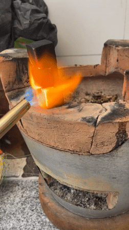 Early morning charcoal cooking and fish meal in Vietnam