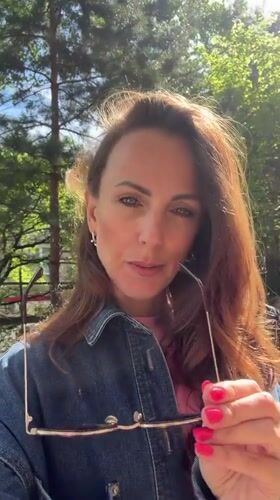 Woman takes outdoor selfies in Birobidzhan late night