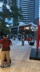 Outdoor soccer watch party draws flag-waving crowd in Burnaby plaza