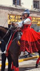 Protest and traditional procession intersect in historic Cuzco