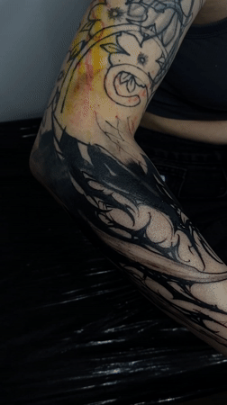 Tattoo session documented in Moscow studio