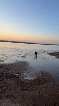 Evening life captured along Samara's Volga waterfront during sunset