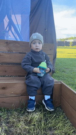 Mother and toddler enjoy outdoor afternoon in Vysokinichi