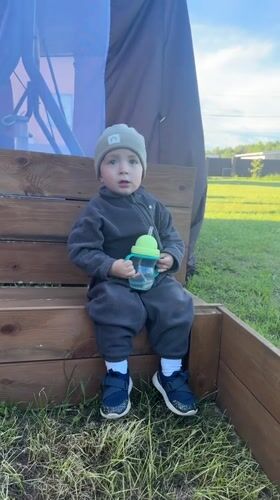 Mother and toddler enjoy outdoor afternoon in Vysokinichi