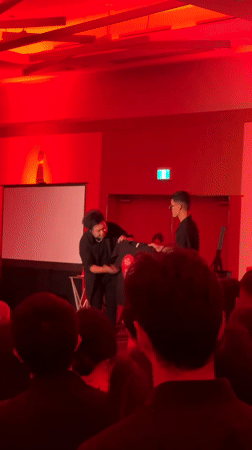 Vancouver fashion show and stage presentations under red lighting