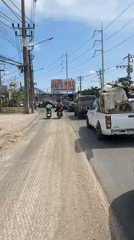 Motor scooter records street traffic in Chalong, Thailand