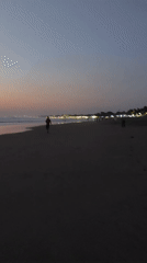 Beach at dusk, waves and fading light from multiple angles
