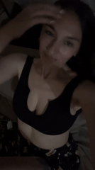 Woman records selfie videos indoors in Sochi, Russia