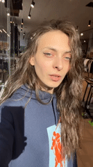 Woman takes selfies in Krasnoyarsk store