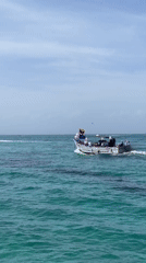 Festive boat outing on turquoise waters near Porlamar, Venezuela