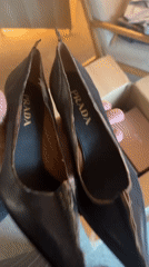 London office workers share cookies, examine luxury goods