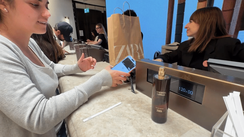 Routine shopping activity documented in Milan Zara district