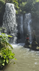 Sukawati waterfall and temple architecture documented by witness