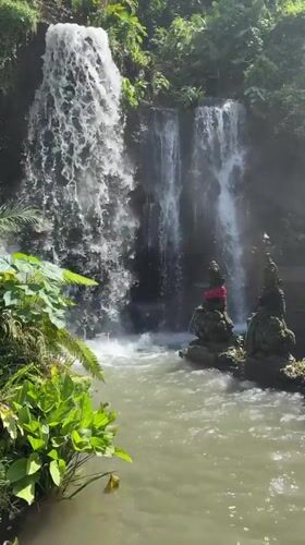 Sukawati waterfall and temple architecture documented by witness