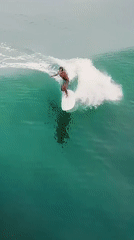 Early morning surfing and aerial shots documented in Kuta Selatan