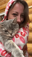 Quiet evening moments with pet cat captured at Russian cabin