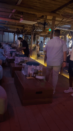 Visitor documents Dubai beach resort with surf club amenities