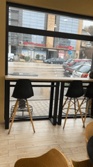 Rainy morning view from cafe window in Pleven