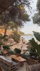 Lazy afternoon at a Sant Antoni beach cove and its restaurants