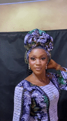 Woman poses for traditional portrait session in Nigeria