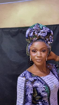 Woman poses for traditional portrait session in Nigeria