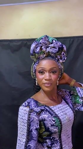 Woman poses for traditional portrait session in Nigeria