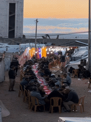 Gaza Community Holds Outdoor Ramadan Meal in Camp Setting