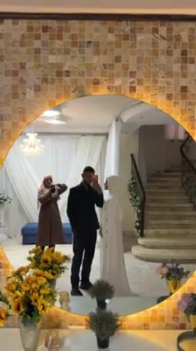 Gaza wedding celebration captured in mirror selfies