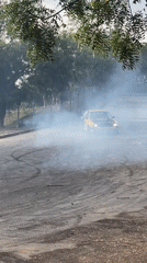 Modified BMW performs drift stunts in Abuja lot