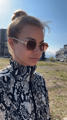 Woman filmed at sunny Turkish coastal locations near Mezitli