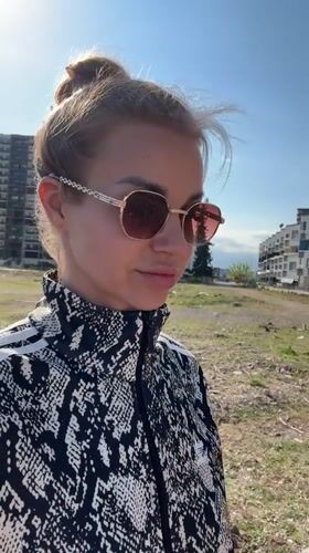 Woman filmed at sunny Turkish coastal locations near Mezitli