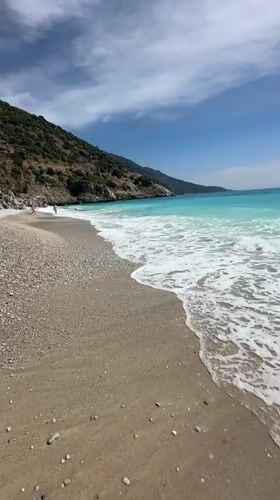 Parasailing, paragliding observed at sunny Fethiye beach resort