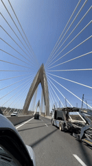 Vehicle crosses cable-stayed bridge in Salé, Morocco