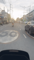 Motorcyclist records routine traffic in Pattaya City, Thailand