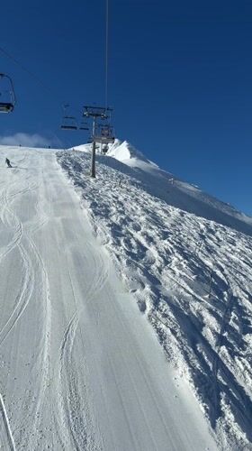 Morning ski lift operations captured at Bansko resort