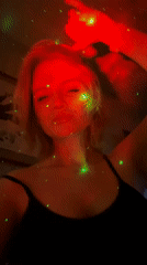 Woman performs with laser light display in Saint Petersburg