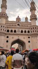 Evening market activity documented around Hyderabad's historic Charminar monument