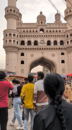Evening market activity documented around Hyderabad's historic Charminar monument
