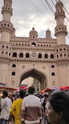 Evening market activity documented around Hyderabad's historic Charminar monument
