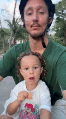 Father films bike ride with child in Playa del Carmen
