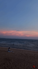 Beach gathering with games and relaxation in Pattaya sunset