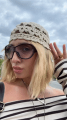 Selfies and a stroll on a Tbilisi bridge, August afternoon.