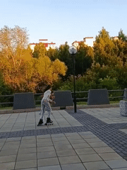 Rollerblading in a Petrozavodsk plaza at golden hour