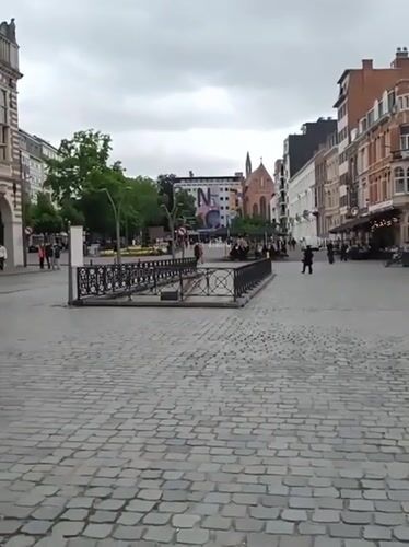 Afternoon stroll documented through Leuven's historic cobblestone squares