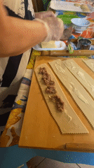 Handmade pasta being prepped on a wooden board in Silvi