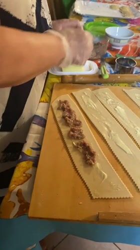 Handmade pasta being prepped on a wooden board in Silvi