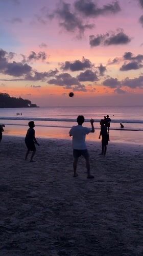 Sunset volleyball and nightfall on a Kuta Selatan beach