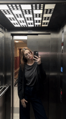 Woman Takes Elevator Selfie in Kragujevac